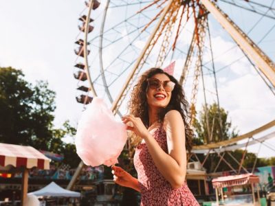 Smiling,Woman,With,Dark,Curly,Hair,In,Sunglasses,And,Birthday